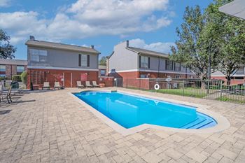 Two swimming pools with relaxed seating
